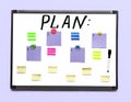 White board with a plan and colored sheets of paper for notes, on a light wall Royalty Free Stock Photo