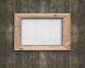 White board with wooden frame on old brown wood wall Royalty Free Stock Photo