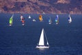 Yachts sailing in blue sea