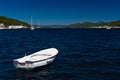 White boat at blue sea. Adriatic coast Royalty Free Stock Photo