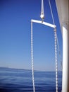 White boat chain over blue sky and sea Royalty Free Stock Photo