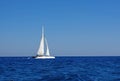 White boat with sails in the Mediterranean Royalty Free Stock Photo