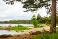 White boat on sandy shore. Hamina camping, Finland, Suomi