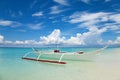 White boat on a tropical beach Royalty Free Stock Photo