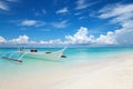 White boat on a tropical beach Royalty Free Stock Photo