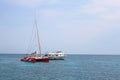 White boats, catamaran and floating people in the Red sea, Egypt