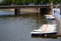 White boats for river walks, boats moored to the river bank, pleasure boats. Royalty Free Stock Photo