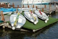 White boats stacked at marina