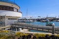 White boats and yachts at the docks in the harbor with deep blue ocean water and blue sky at Burton Chace Park Royalty Free Stock Photo