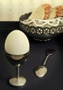 White boiled egg in silver cup