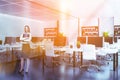 White bookcases office corner, glass wall, woman Royalty Free Stock Photo