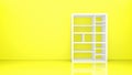 White bookshelf isolated on yellow solid wall background.