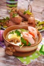 White borscht with rolled ham on skewer for easter Royalty Free Stock Photo