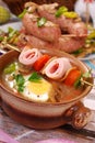 White borscht with rolled ham on skewer for easter Royalty Free Stock Photo