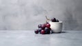 Minimalist Ceramic Bowl With Grapes On Concrete Wall