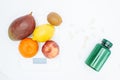 White bottle with pills on scales for food Royalty Free Stock Photo