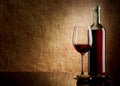 White bottle with red wine and glass and cork Royalty Free Stock Photo