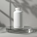 White bottle with ribbed cap centered on a clear platform with shadows on a white background Royalty Free Stock Photo