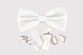 White bow tie with cuff links Royalty Free Stock Photo