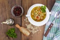 White bowl of chicken and wild rice soup with vegetables Royalty Free Stock Photo