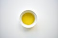 White bowl extra virgin olive oil close up