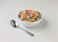 Dry sugar coated fruity flavored cereal in a bowl