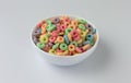 Dry sugar coated fruity flavored cereal in a bowl
