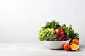 A White Bowl Filled With Lots Of Different Fruits And Vegetables Royalty Free Stock Photo