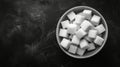 White Bowl Filled With Sugar Cubes on Table