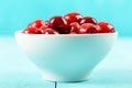 White Bowl Of Fresh Red Cherries On Turquoise Royalty Free Stock Photo