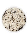 White bowl of raw organic basmati long grain and wild rice on white background. Healthy food Royalty Free Stock Photo