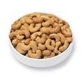 White bowl with with salted cashew nuts close up on white background Royalty Free Stock Photo