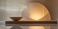 White bowl sits on a wooden table next to a lighted ball Royalty Free Stock Photo