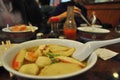 A white bowl of yellow noodles, food time.