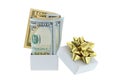 A white box with golden gift ribbon with with new United stated dollar