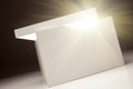 White Box with Lid Revealing Something Very Bright Royalty Free Stock Photo