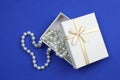 In a white box lies pearl beads Royalty Free Stock Photo