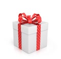 The white box wrapped with red ribbon with a bow Royalty Free Stock Photo