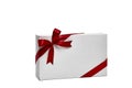 The white box wrapped with red ribbon with a bow Royalty Free Stock Photo