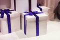White boxes with gifts decorated with ribbons holiday