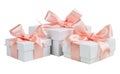 White boxes with pink ribbons isolated on white background Royalty Free Stock Photo