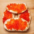 White bread sandwiches red caviar butter