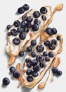 Sandwiches with cream goat cheese, blueberries and honey