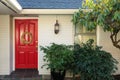 White Brick Front Porch With Red Door Royalty Free Stock Photo