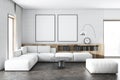 White brick living room, white sofa, posters Royalty Free Stock Photo