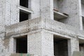 White brick multi-family house under construction. Construction site. Building site of new home Royalty Free Stock Photo