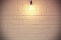 White brick room with bulb - vintage