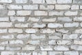 White brick wall texture showcasing construction and raw industrial material, forming a rugged architectural background Royalty Free Stock Photo