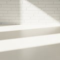 White brick wall with horizontal lines casts soft light and shadow patterns. The light creates Royalty Free Stock Photo