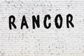 Word rancor painted on white brick wall Royalty Free Stock Photo